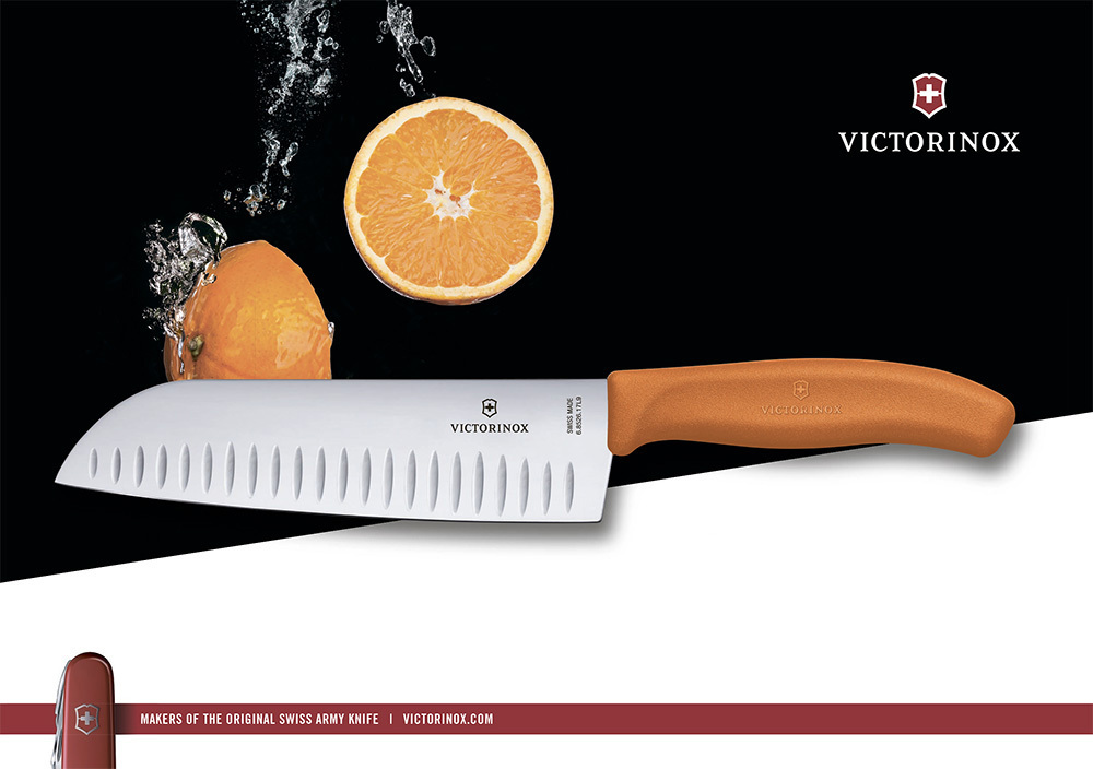 Нож Victorinox "Santoku", лезвие 17 см рифленое, оранжевый, в картонном блистере Нож Victorinox "Santoku", лезвие 17 см рифленое, оранжевый, в картонном блистере